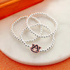 Auburn Glitter Enamel Logo Stretch Bracelet Set