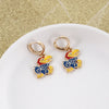 Kansas Gold Huggie Hoop Earrings w/Enamel Logo