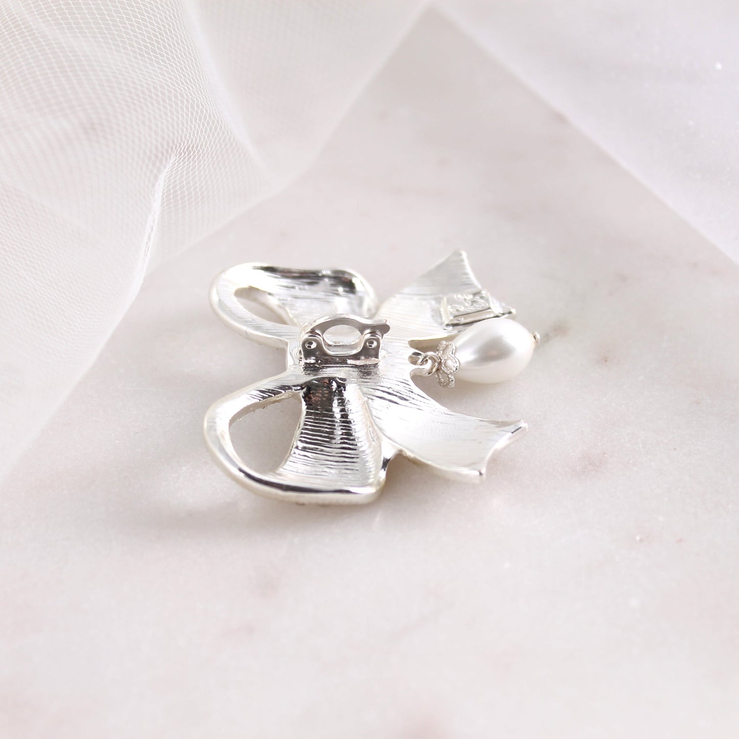 Crystal Bow w/ Dangle Pearl Pendant